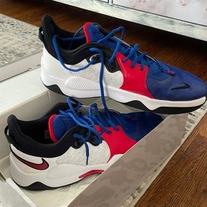 Blue and red Nike shoes